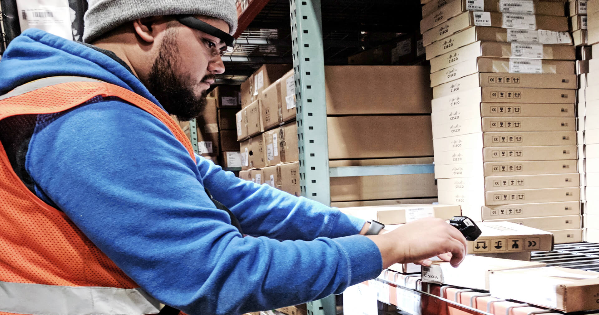 Warehouse employee using scanning equipment